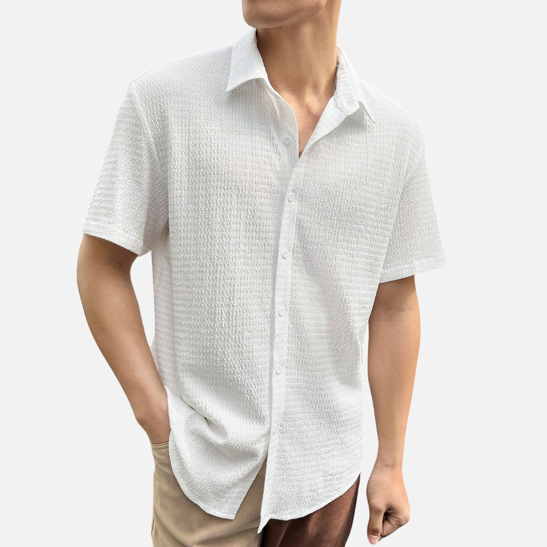Camisa Social Masculina Norvitz NV136 com ombros caídos, tecido leve e fechamento por botões. Estilo moderno e versátil para o dia a dia.