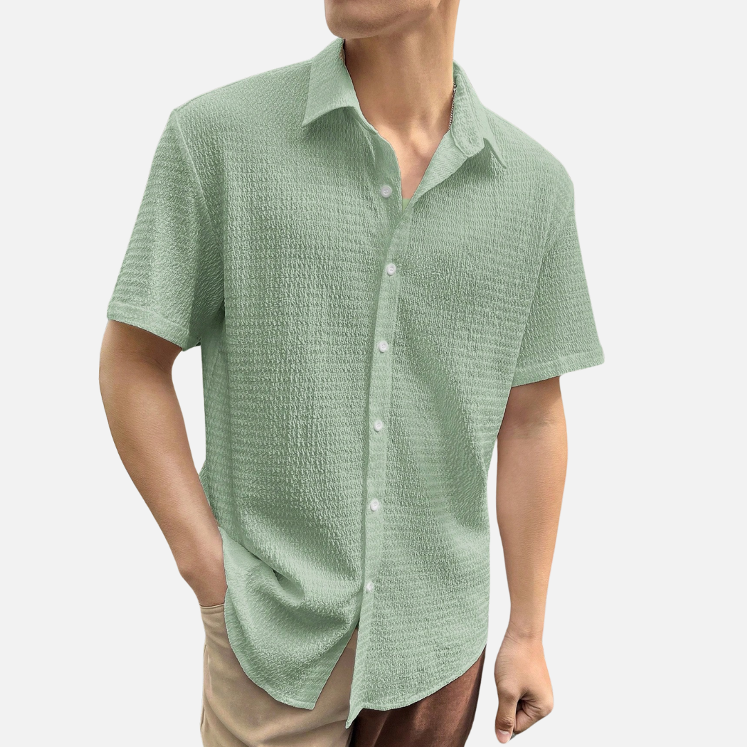 Camisa Social Masculina Norvitz NV136 com ombros caídos, tecido leve e fechamento por botões. Estilo moderno e versátil para o dia a dia.