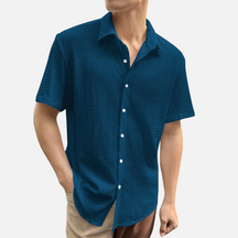 Camisa Social Masculina Norvitz NV136 com ombros caídos, tecido leve e fechamento por botões. Estilo moderno e versátil para o dia a dia.