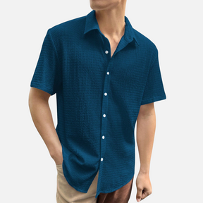 Camisa Social Masculina Norvitz NV136 com ombros caídos, tecido leve e fechamento por botões. Estilo moderno e versátil para o dia a dia.