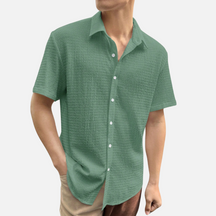 Camisa Social Masculina Norvitz NV136 com ombros caídos, tecido leve e fechamento por botões. Estilo moderno e versátil para o dia a dia.